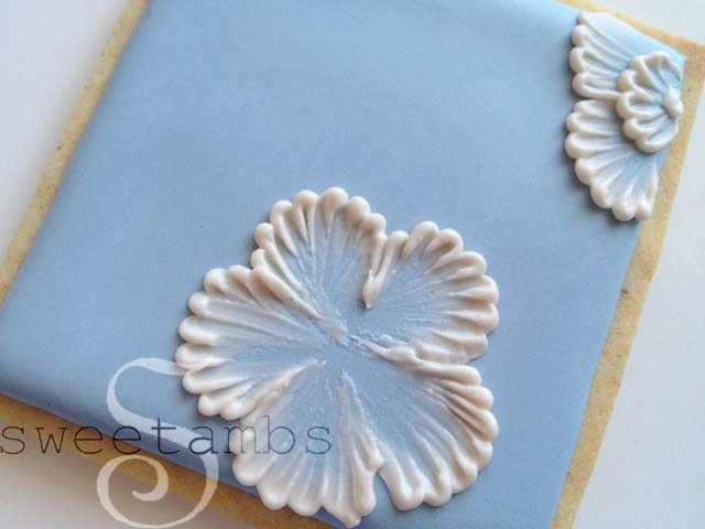The first layer of brush embroidered flower petals.