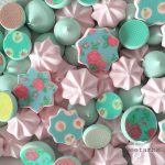 meringue cookies decorated with sugar stamps