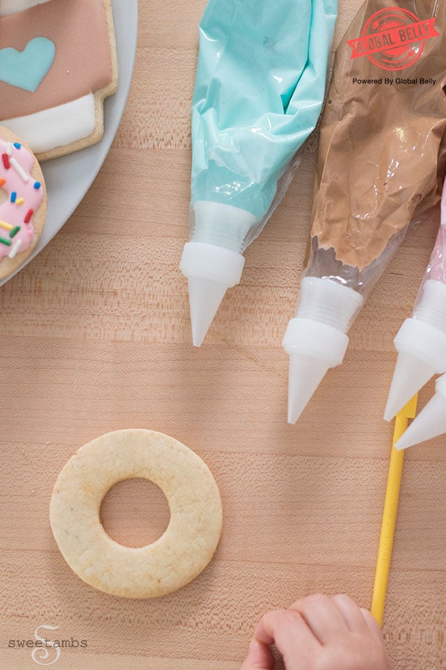 Toddler decorating cookies