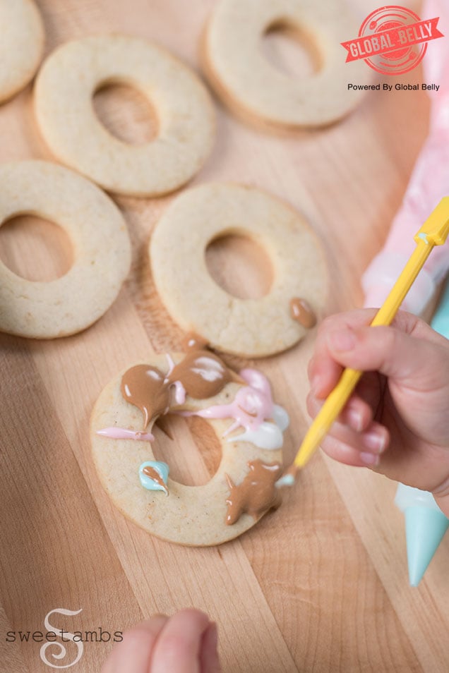 Toddler decorating cookies