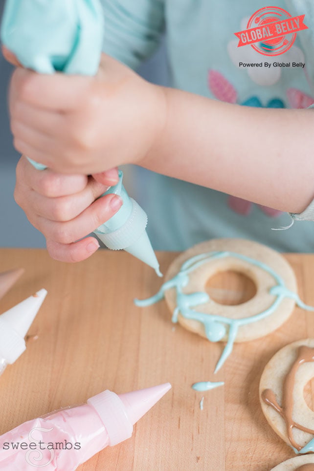 Toddler decorating cookies