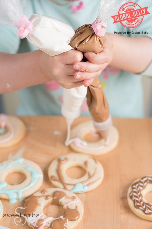 Toddler decorating cookies