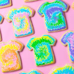 cookies decorated to look like tie dye t-shirts