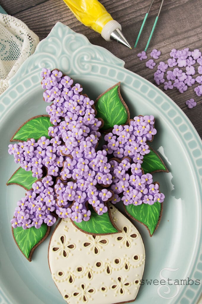 Lilac cookies in a cookie vase