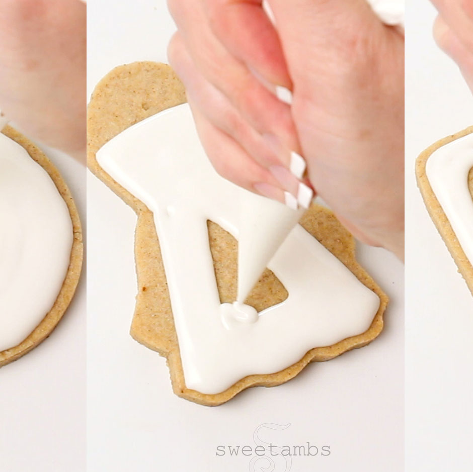 Flooding an apron shaped cookie with white icing