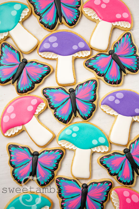 brightly colored mushroom and butterfly cookies