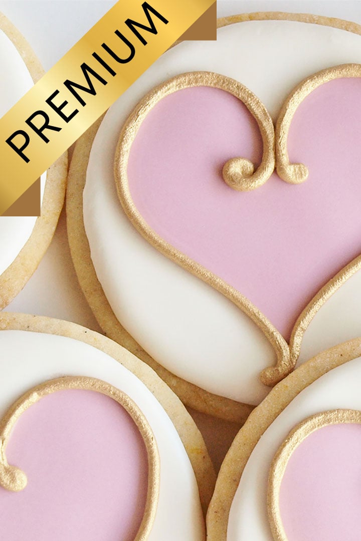 Cookies decorated with pink hearts outlined with gold. A banner with the word Premium is across the top left corner of the image.