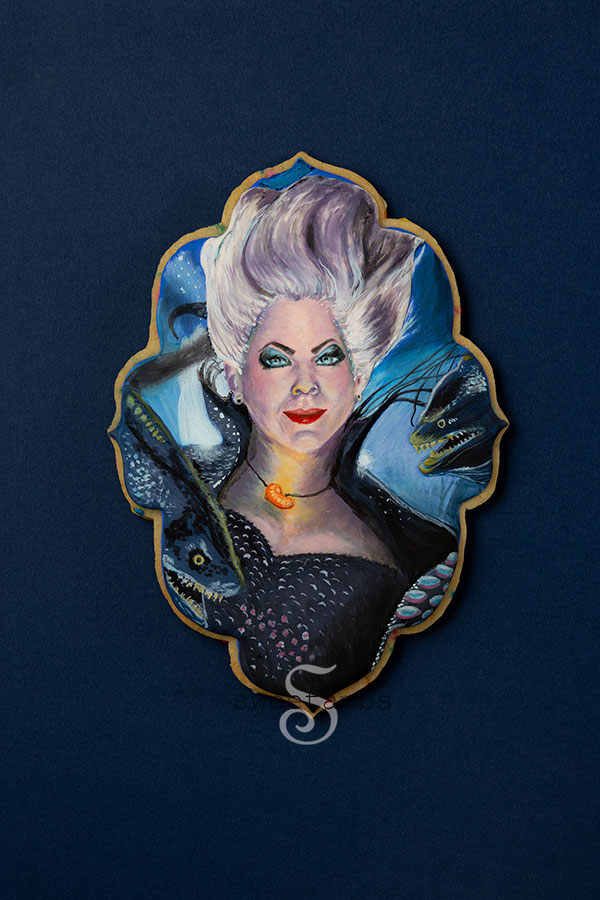 A cookie decorated to look like Ursula from the live action version of The Little Mermaid